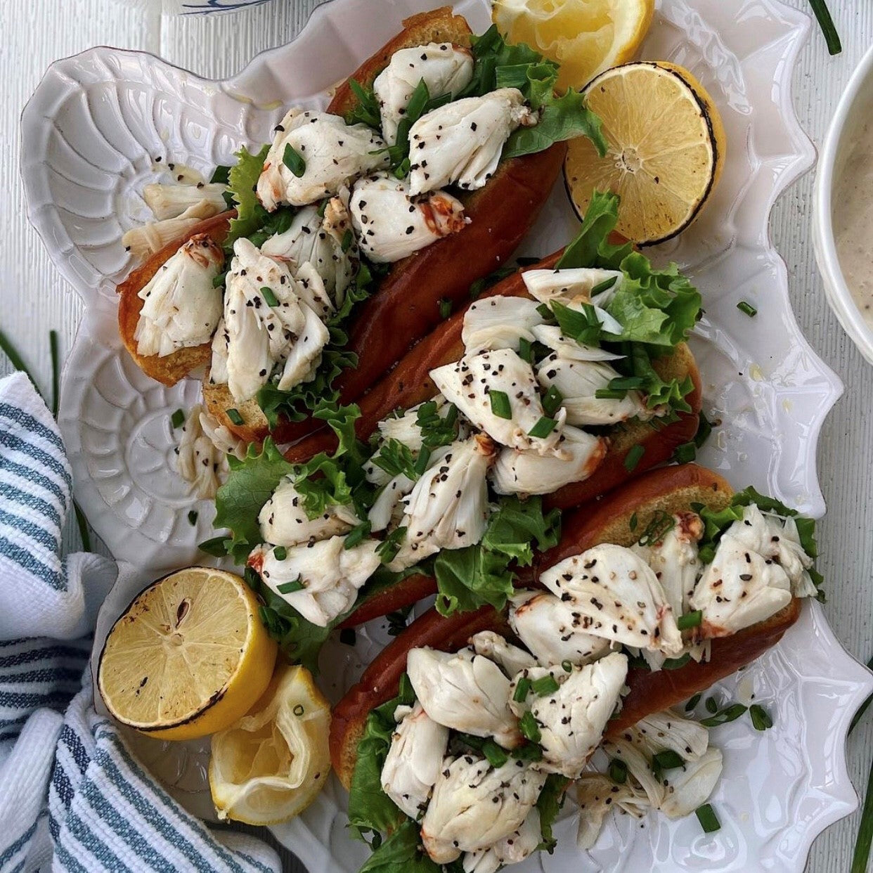 crab roll served with lemon and chives